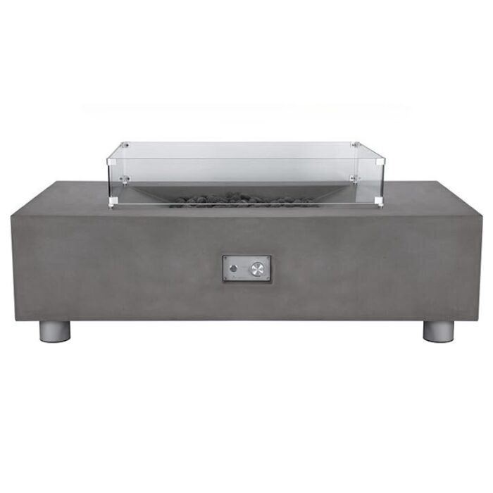Modern concrete fire pit table with glass wind guard and decorative black stones. Ideal for outdoor gatherings and cozy evenings.