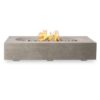 Modern concrete fire pit with flames and decorative stones, perfect for outdoor gatherings and ambiance.