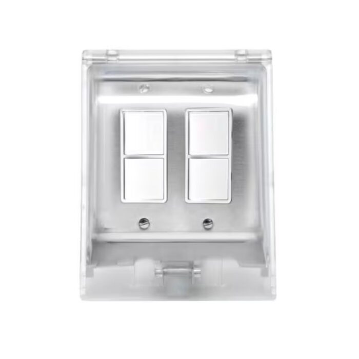 Clear plastic electrical switch panel with four square buttons.